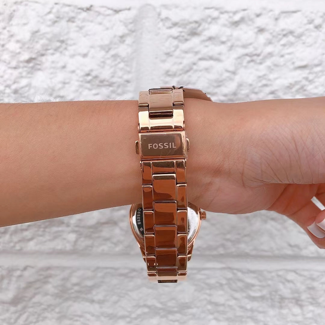 Fossil ES3590 Stella Multifunction Rose-Tone Stainless Steel Watch Fossil ES3590 Stella Multifunction Rose-Tone Stainless Steel Watch